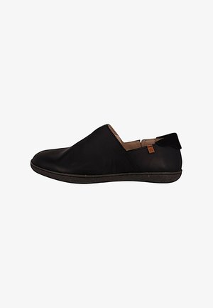 Black slip-on shoe with a smooth leather upper, rounded toe, and minimalistic design. Includes a textured rubber sole and subtle branding.