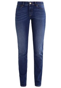 Slim-fit modré džíny z denimu s středně vysokým pasem, pěti kapsami a předním zapínáním na knoflík. Tkanina má jemnou elasticitu pro pohodlí.