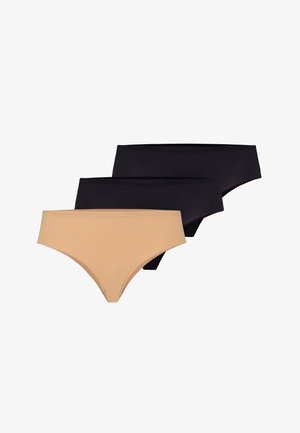 Trois culottes hipster sans couture pour femmes en noir et beige, empilées avec la paire beige devant.