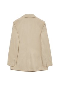 Beżowa marynarka ze sztruksu z kołnierzem z klapami, pojedynczym rozcięciem z tyłu i dopasowanym krojem. Charakteryzuje się pionową, prążkowaną fakturą oraz dwoma bocznymi kieszeniami z rozcięciami.