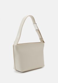 Calvin Klein EMBOSSED LOGO SMALL TOTE - Borsa a mano - gray morn