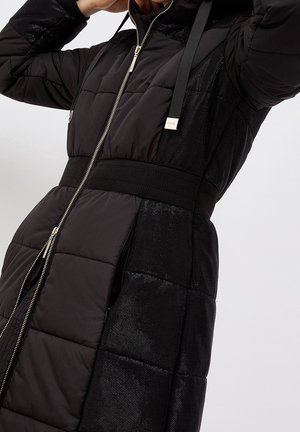 Abrigo de invierno - black