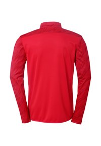 Rød langærmet skjorte med en ensfarvet front og et mønstret tekstur på ærmerne, med en høj krave design. Atletisk pasform og glat stof.