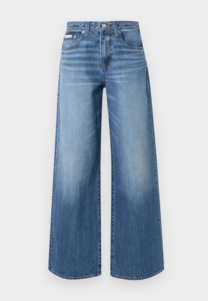 Blauwe wijde denim jeans met vooraan een knoop en rits, vijfzakkenmodel en subtiele vervaagde details op de dijen en knieën.