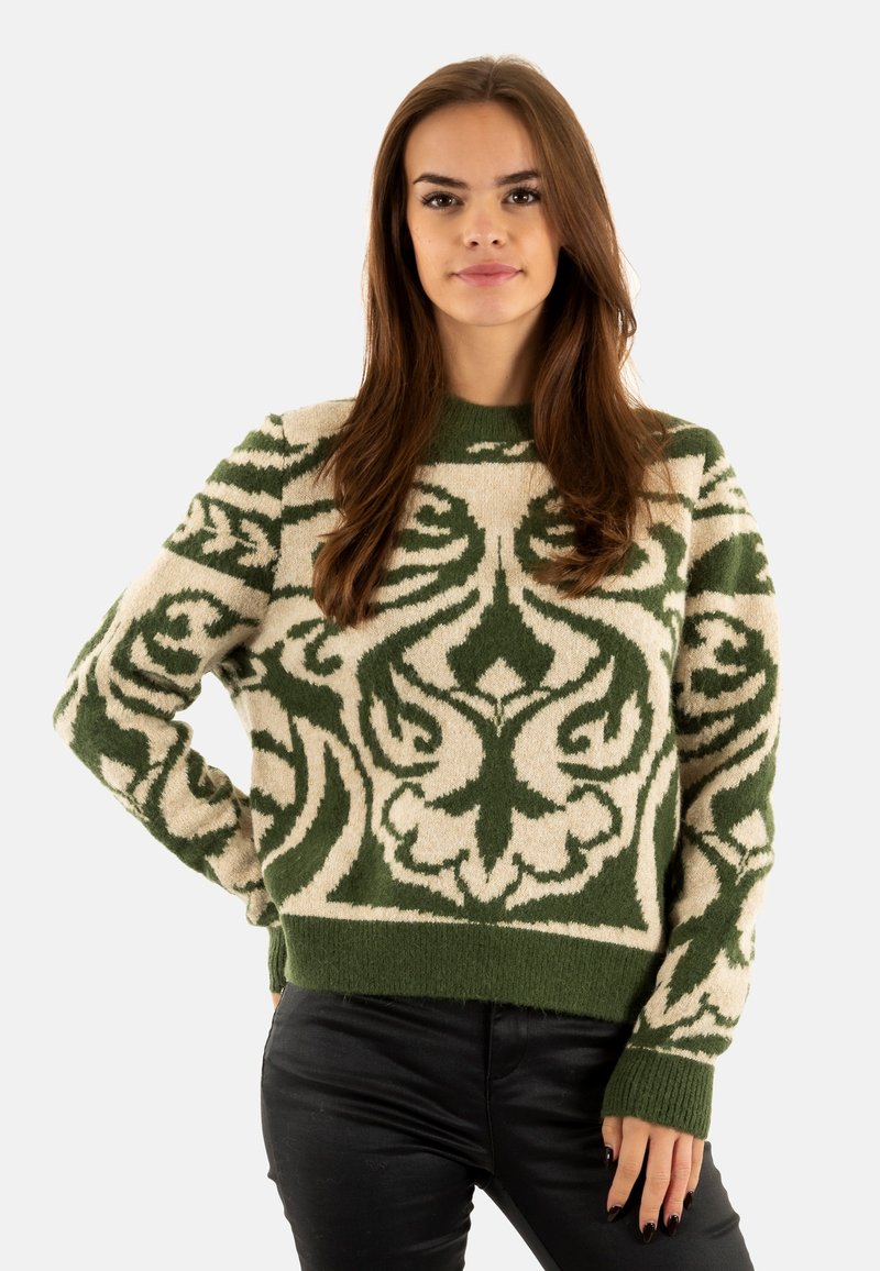 Suéter de punto con una base marfil y patrones florales verdes intrincados, cuello redondo y puños acanalados. Material suave y texturizado.