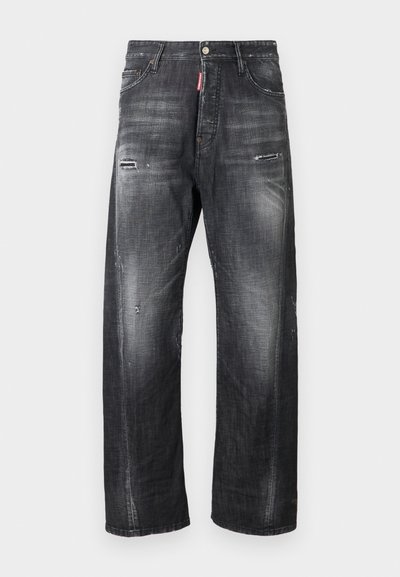 Dark gray denim jeans with a loose fit, featuring distressing at the knees, a button fly, and a red logo tag near the waistband.