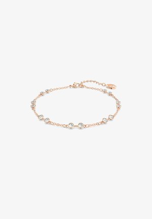Bracelet délicat en or rose, orné de strass ronds espacés uniformément, avec un fermoir et une chaîne ajustable pour un ajustement personnalisé.