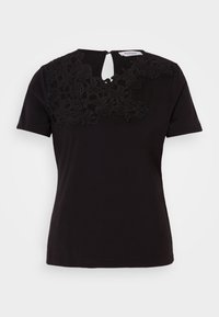 Sort kortærmet t-shirt med blomsterdetskede detaljer ved rundingen og en nøglehulåbning på ryggen. Blødt bomuldsstof.