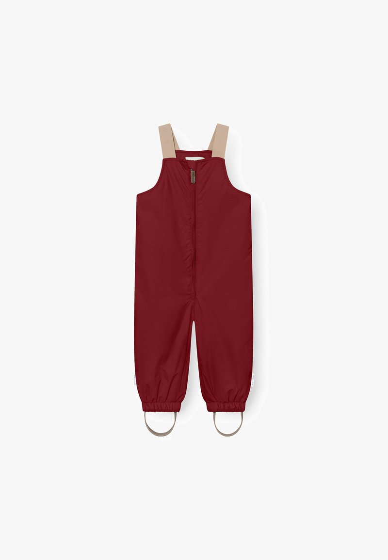 Crvena vodootporna overall s bež podesivim trakama, prednjim zatvaračem na zip, elastičnim manžetama i kružnim detaljima na gležnjevima. Glatka tekstura.