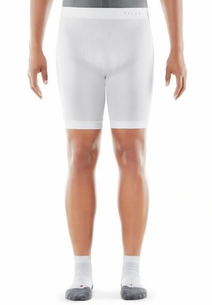 Shorts de compression blancs en matériau extensible, avec une texture lisse et une taille élastique. Accompagnés de chaussettes blanches mi-mollet avec des accents gris.