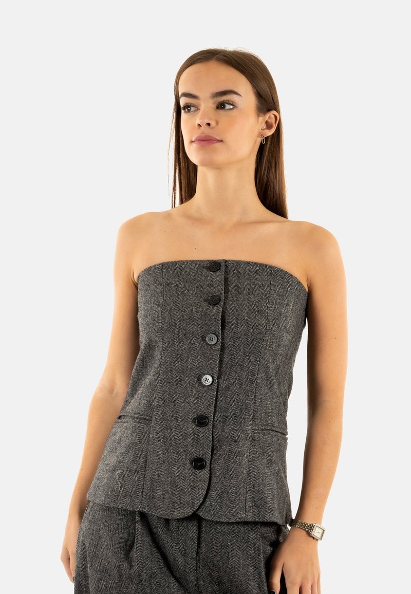 Top senza spalline, grigio scuro, con motivo a pied de poule e una silhouette aderente, caratterizzato da una chiusura con bottoni sul davanti e due tasche laterali.