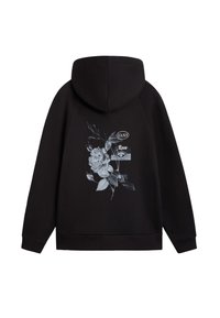 Felpa nera con superficie testurizzata, dotata di una grafica floreale grigia sul retro e di un'etichetta con logo vicino al colletto.