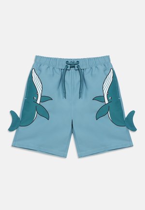 Shorts de bain bleus avec un motif de baleine, comprenant une taille à cordon de serrage et des accents de queue sur les côtés. Tissu lisse et léger.
