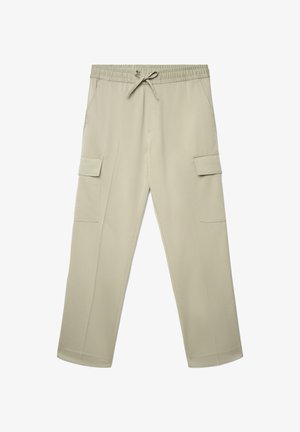 Beige cargo pants with an elastic waistband and drawstring, featuring two side pockets and two large cargo pockets on the thighs.