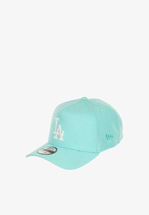 Turquoise baseball cap with white "LA" logo embroidered on front and adjustable strap, displayed on white background.