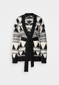 Μπλεζάκι με μοτίβο σε ασπρόμαυρο, μακριά μανίκια, γιακά σαν σάλι, και ζώνη που δένει στο ίδιο σχέδιο. Διακοσμημένο με γεωμετρικά σχέδια και πλεκτή υφή.