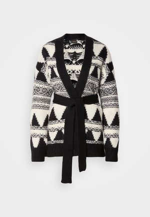 Cardigan a maniche lunghe con motivo a fantasia bianco e nero, colletto a scialle e cintura abbinata. Presenta disegni geometrici e una texture a maglia.