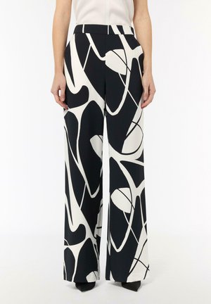 - Spodnie materiałowe