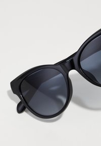 Fossil Lunettes de soleil - black