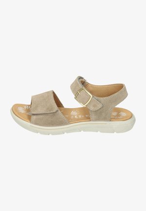 Beige suede sandal with wide strap, adjustable buckle, and white rubber sole. Floral design on insole, lightweight with textured detailing.