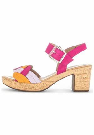 Multicolored sandal featuring pink, orange, and lavender straps. Has a cork-textured platform and block heel with a silver buckle.