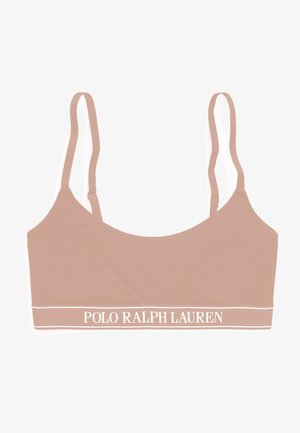 Bralette Polo Ralph Lauren en color beige claro con tirantes delgados ajustables y una banda con logo blanco en la parte inferior. Textura de tela suave.