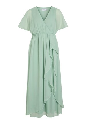 Vestido verde claro de manga corta y escote en V, con cintura fruncida y volantes en cascada de un lado, de longitud midi y fabricado en tejido ligero.