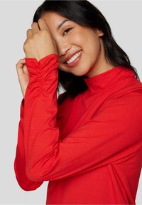 Rabe Langarmshirt - orange