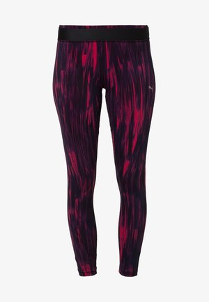 Leggings ajustés en mélange de tissus, avec une base violet foncé et des rayures abstraites roses et rouges. Ceinture élastique noire.