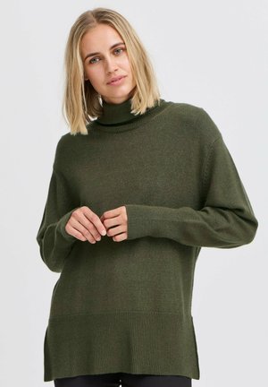 Oliven grøn sweater med høj hals, ribstrikkede manchetter, sideslids og en glat tekstur. Designet har sænkede skuldre og en afslappet pasform.