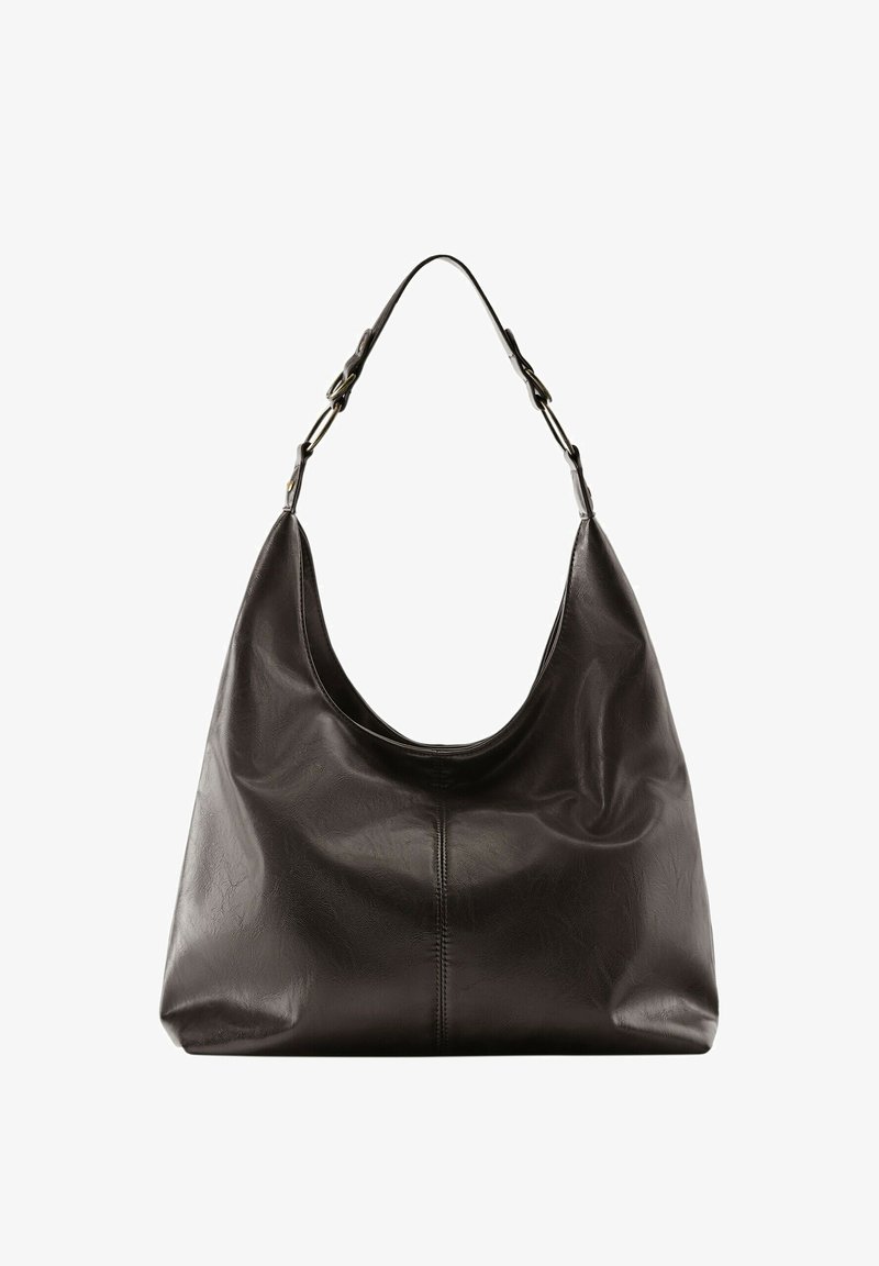 Sac hobo en cuir noir avec bandoulière réglable et surpiqûre centrale visible sur une surface lisse.