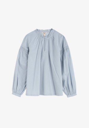 Heledad siniste värvi pluus, millel on kogutud kaelus, nööpidega esitasku ja smockitud detailid ülemistel varrukatel.