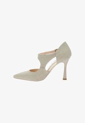 Scarpa da donna con tacco alto color beige con punta affilata, lati traforati e cinturino alla caviglia, tomaia in tessuto strutturato, tacco sottile.