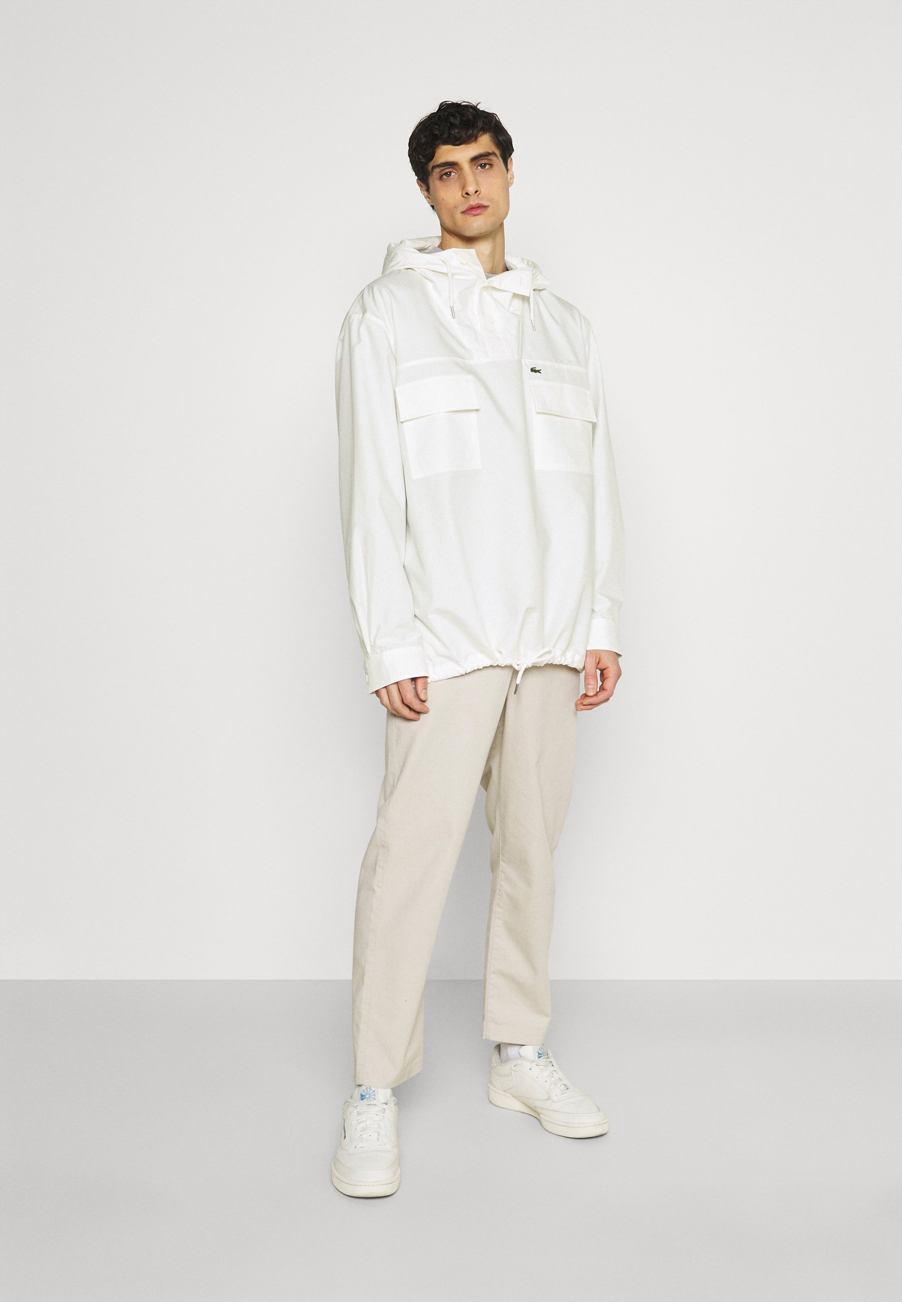 white lacoste jacket