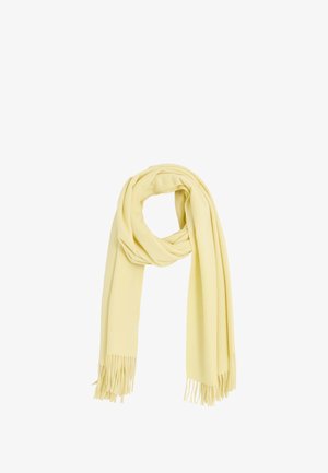 Écharpe jaune clair en tissu doux avec des extrémités à franges. Drapée en boucle lâche, mettant en valeur une texture lisse et une couleur uniforme.