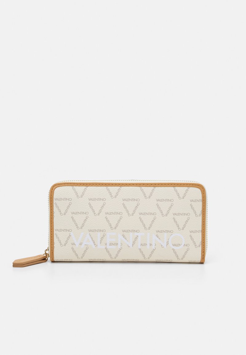 Valentino wallet in beige leather with repeating logo pattern. Features a zip closure, contrasting tan accents, and a textured finish.