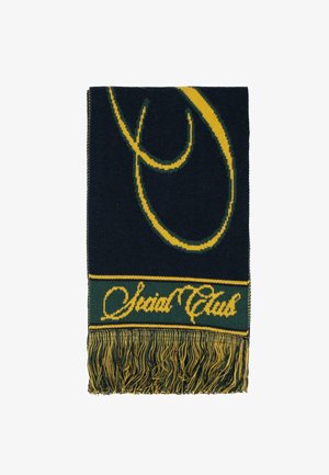 Wool scarf in navy blue with green and yellow accents. Features a large graphic design and fringed edges. Text reads "Social Club."