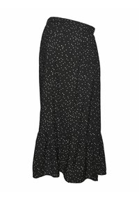 Jupe noire avec un ourlet évasé, ornée de pois blancs sur l'ensemble. Fabriquée en tissu léger avec une taille élastique.