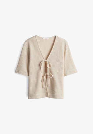 Beige gerippter Strickoberteil mit kurzen Ärmeln und tiefem V-Ausschnitt. Mit einem gebundenen Detail vorne, das eine lässige Passform und Struktur bietet.