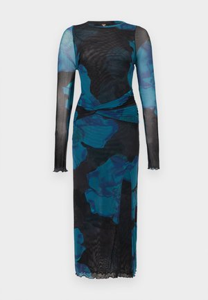 Long-sleeve dress in sheer black fabric with large blue floral prints, featuring a wrap design and ruffled cuffs at the sleeves.