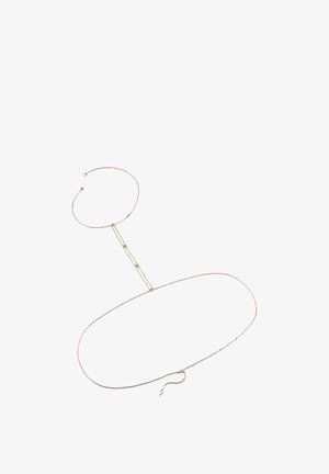 Collier à couches en ton doré avec des chaînes délicates, plusieurs maillons et de petites touches de turquoise. Fermeture ajustable pour un meilleur ajustement.