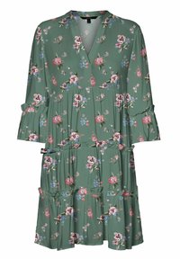 Robe fleurie verte avec un col en V, des manches longues et des poignets à volants. Présente un design à étages avec des fleurs roses et bleues sur un tissu doux.