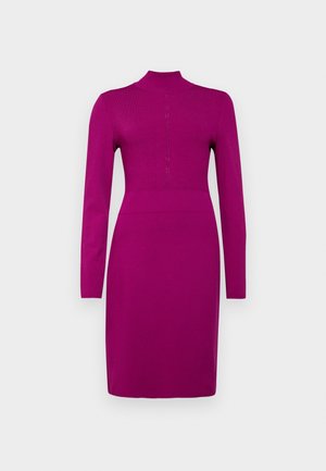 Fitted magenta dress with long sleeves, high neckline, and subtle ribbed texture. Features a back zipper and contouring seams.