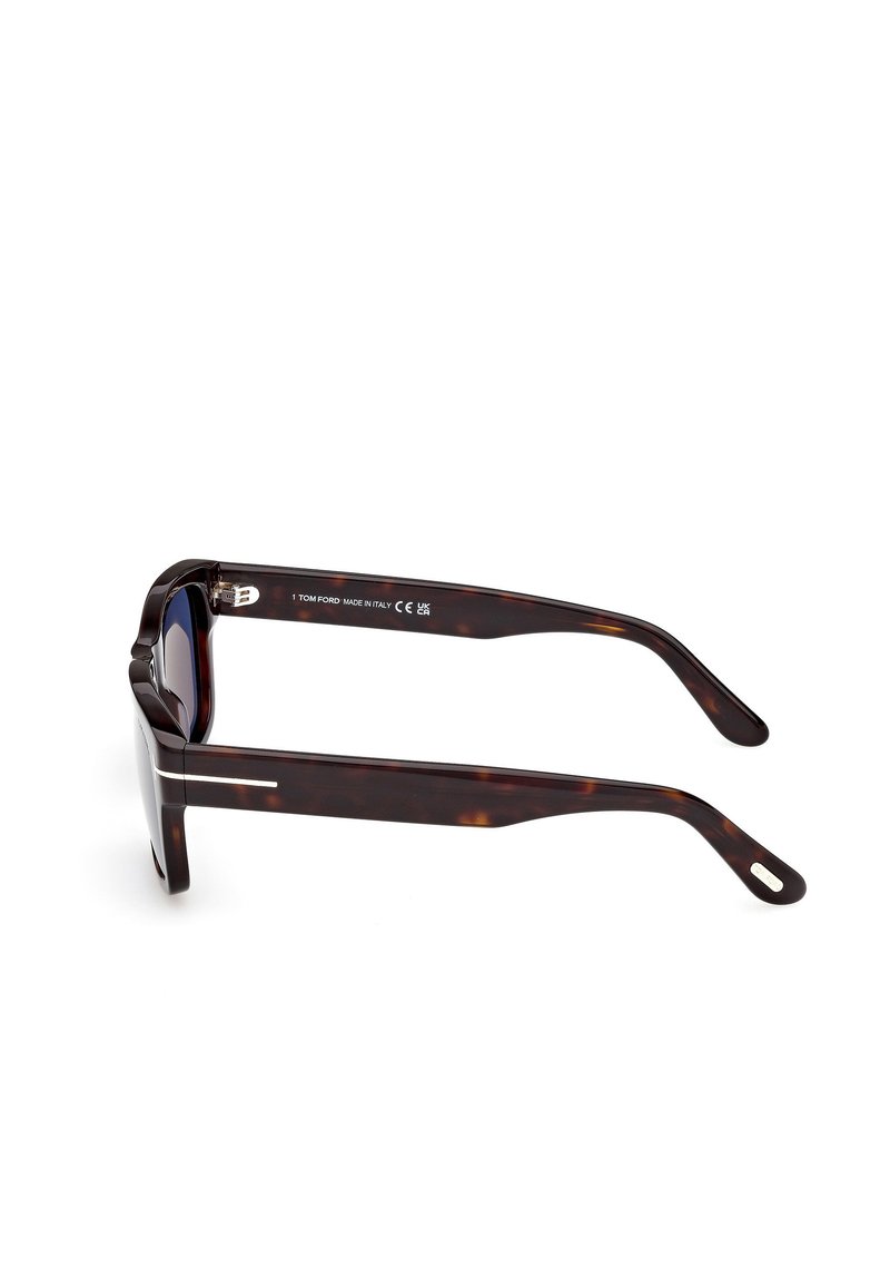 Tortoiseshell sunglasses with dark lenses, rectangular frame design, and metallic accent on the temples. Made from plastic.