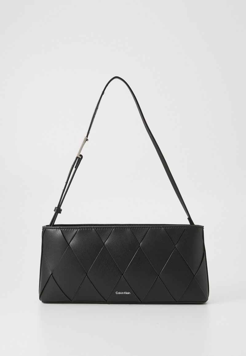 Black leather handbag with a quilted pattern, rectangular shape, and a thin shoulder strap. Features a minimalist silver brand logo.