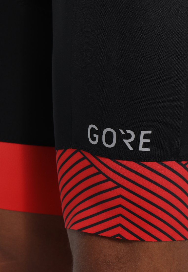 Herren Shirts | Gore Wear C5 OPTILINE KURZE TRÄGERHOSE Tights black/red/rot - QG28112 Herren Shirts | Gore Wear C5 OPTILINE KURZE TRÄGERHOSE Tights black/red/rot - QG28112