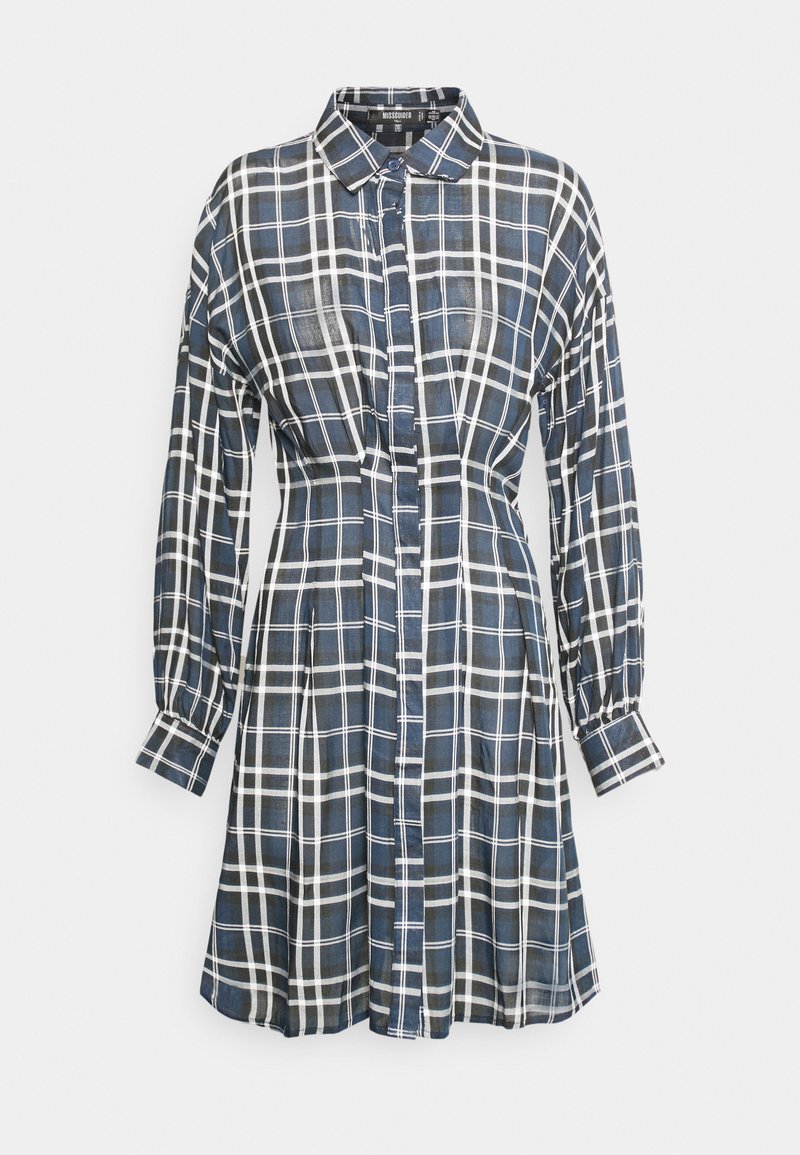 Vestido xadrez com padrão azul marinho e branco, frente com botões, colarinho, mangas longas e saia evasé. Feito de tecido leve.