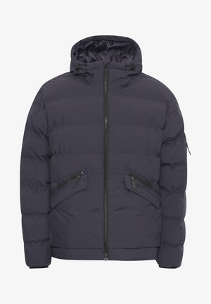 Tengerészeti pufi dzseki kapucnival, cipzáras elülső résszel és két ferde cipzáras zsebbel. Steppelt dizájn és rugalmas mandzsetta jellemzi.