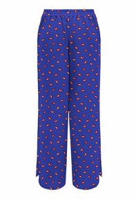 Pantalones de color azul con un patrón, cuentan con una cintura elástica y un motivo repetido de labios rojos. Fabricación ligera, diseño de pierna ancha y aberturas laterales.