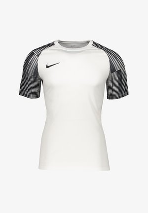 Hvid sportstrøje med sorte stribede kortærmer. Har en rund halsudskæring og Nike-logo på forsiden. Letvægts, åndbart stof.